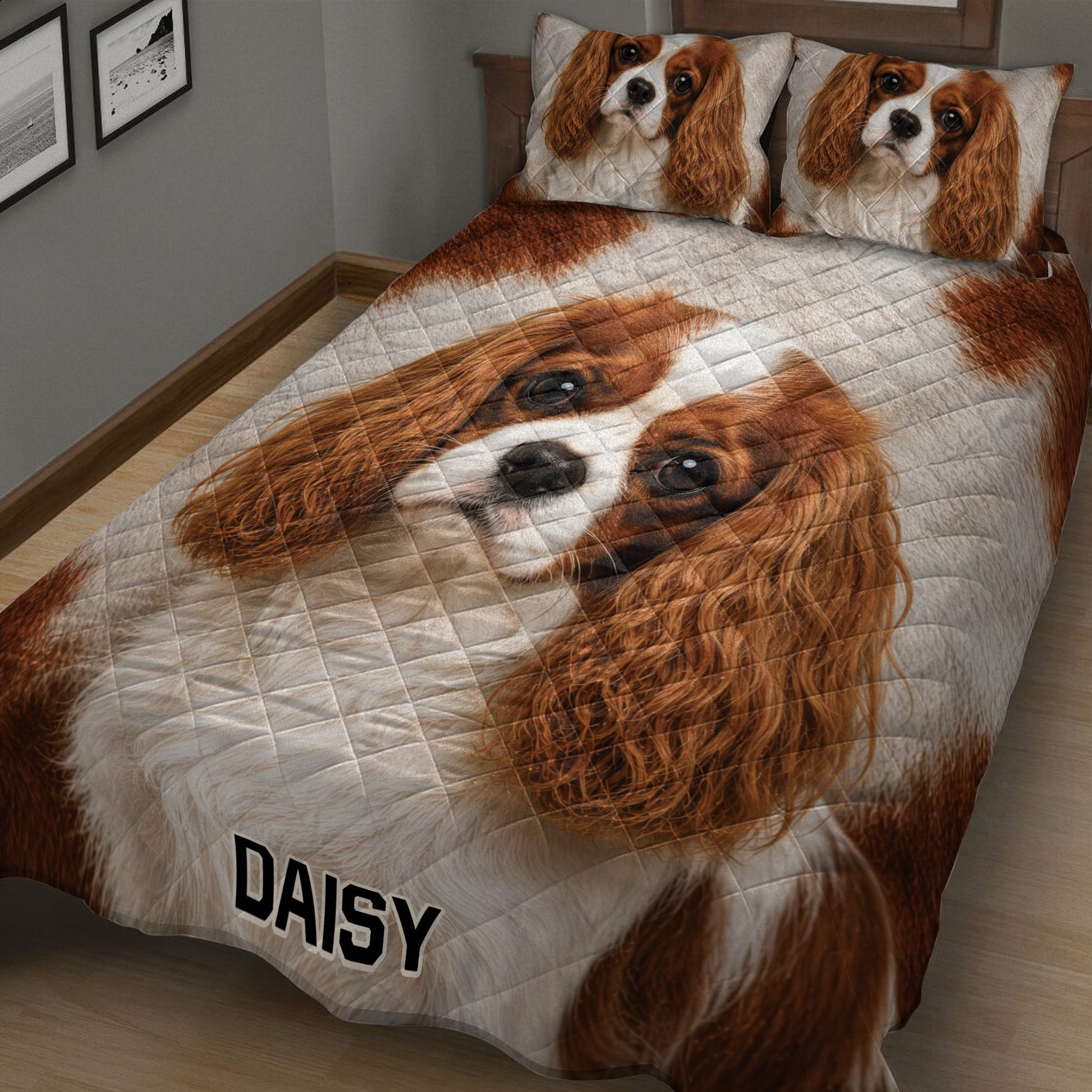 Cavalier King Charles Spaniel quilt blanket shown across a bed with detailed brown and white dog artwork