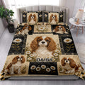 Cavalier King Charles Spaniel floral quilt bedding styled across a bright bedroom