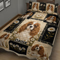 Cavalier King Charles Spaniel quilt blanket shown in a bedroom with daisy artwork