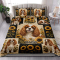 Cavalier King Charles Spaniel quilt blanket styled in a bright bedroom with sunflower and dog artwork