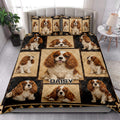Cavalier King Charles Spaniel quilt blanket styled on a bedroom bed with matching dog portrait panels