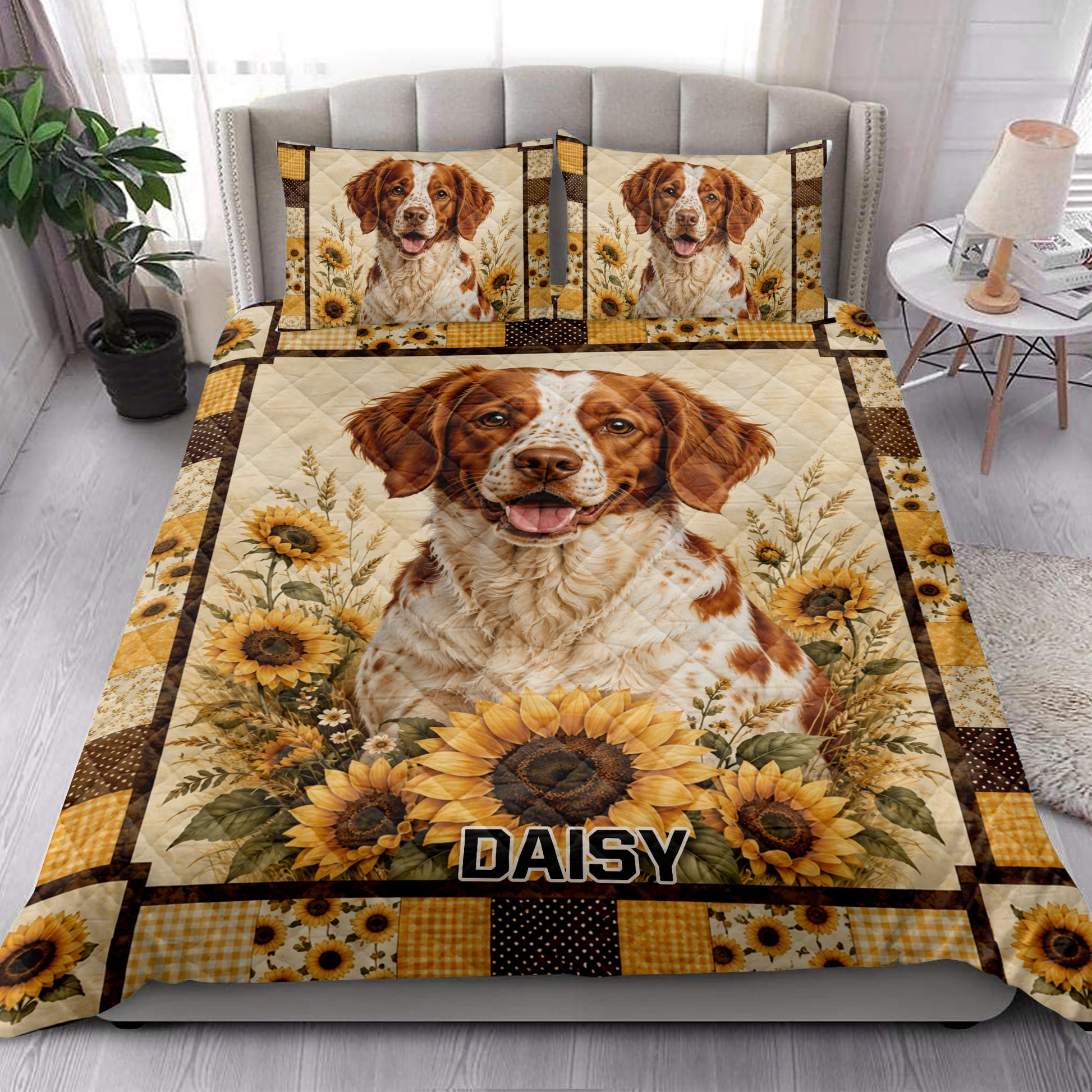 Brittany Spaniel quilt blanket styled in a bright bedroom with sunflower artwork and rustic patchwork