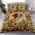 Brittany Spaniel quilt blanket styled on a bed with sunflower and patchwork artwork