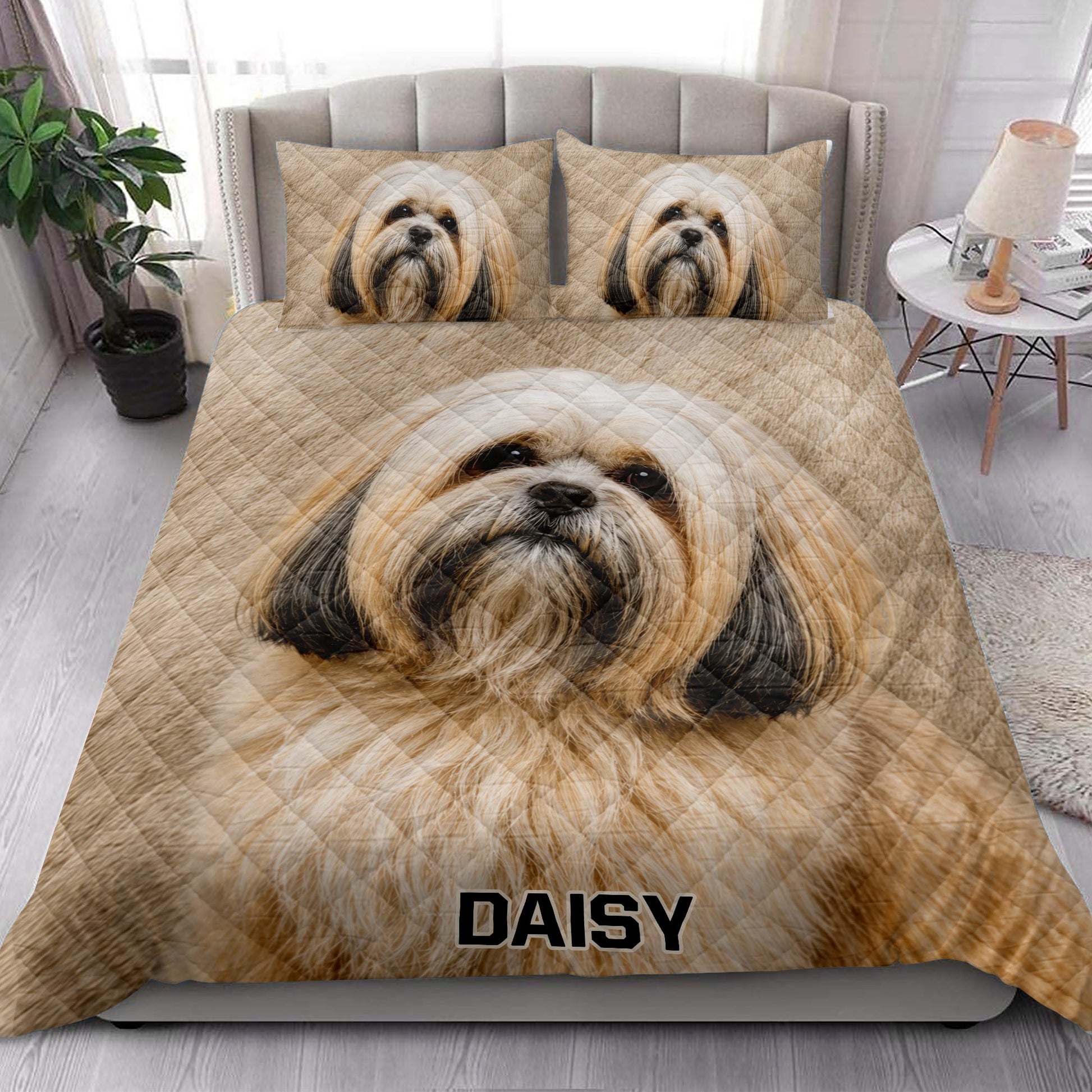 Lhasa Apso quilt bedding styled in a bright bedroom with a large long-haired dog portrait