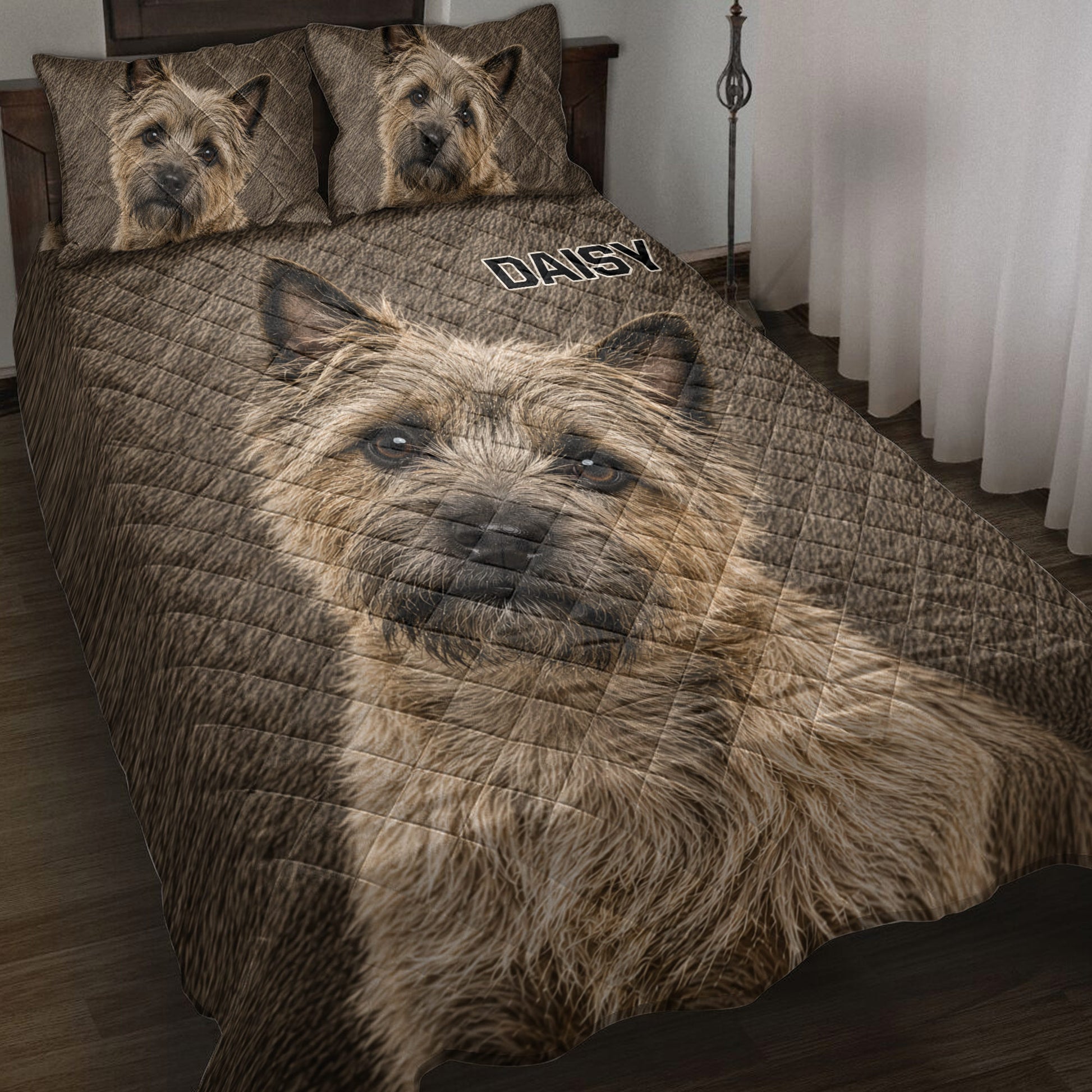 Cairn Terrier quilt blanket spread across a bed with matching dog portrait pillow designs