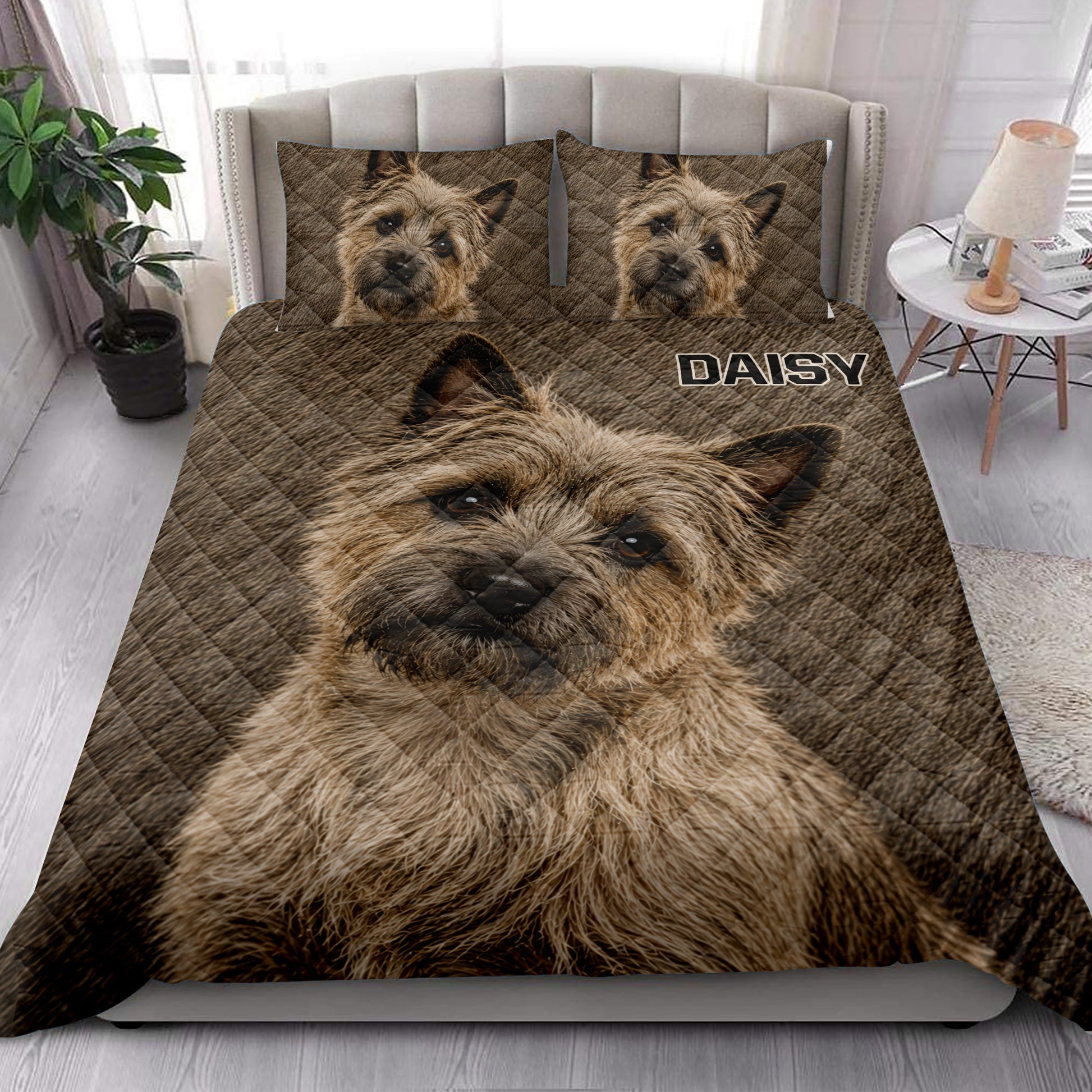Cairn Terrier quilt bedding styled in a bright bedroom with a large dog portrait design