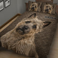 Close view of Cairn Terrier quilt bedding with detailed terrier artwork and matching pillows