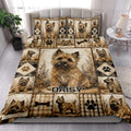Cairn Terrier quilt blanket styled on a bright bedroom bed with matching dog artwork and rustic plaid design