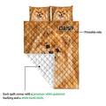 Pomeranian quilt showing the printed front and white quilted reverse side