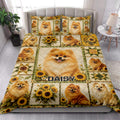Pomeranian quilt blanket styled in a bright bedroom with sunflower and dog artwork