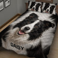 Close bedroom view of a Border Collie quilt blanket with matching portrait pillows