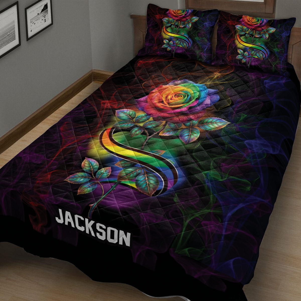 LGBT rainbow rose quilt blanket displayed diagonally across a bedroom with bold Pride colors