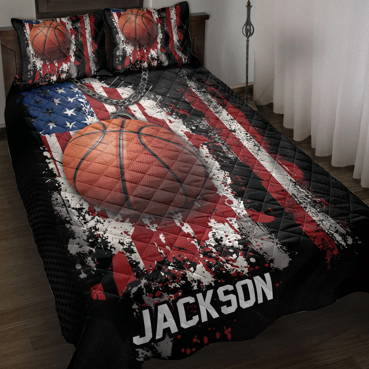 Basketball quilt blanket featuring bold red, black, white and blue sports artwork on a bedroom bed