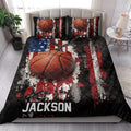 Basketball quilt bedding styled in a bright bedroom with bold sports artwork and matching pillows