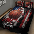 Basketball quilt blanket displayed on a bed with large basketball graphics and patriotic colors