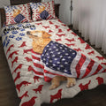 Golden Retriever quilt blanket with American flag artwork, paw prints, and red dog silhouettes on a bed