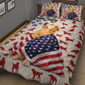 Golden Retriever quilt bedding with American flag artwork, paw prints, and red dog silhouettes in a bedroom