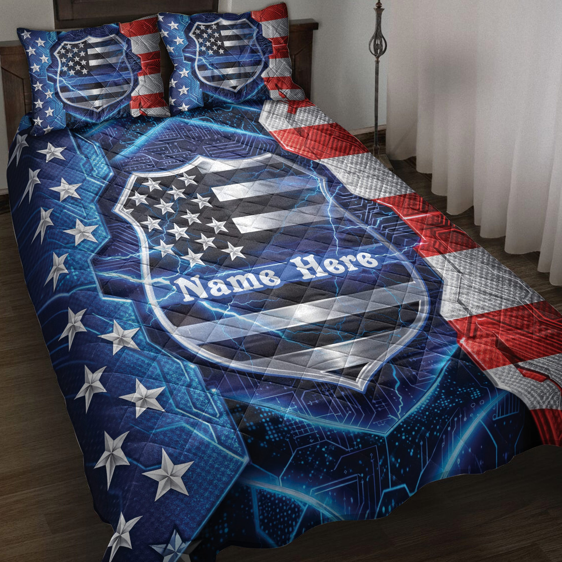 Police quilt blanket displayed on a bed with a patriotic shield design, stars, blue lightning, and red accents