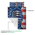 Police quilt close-up showing the printed patriotic shield design and white quilted backing