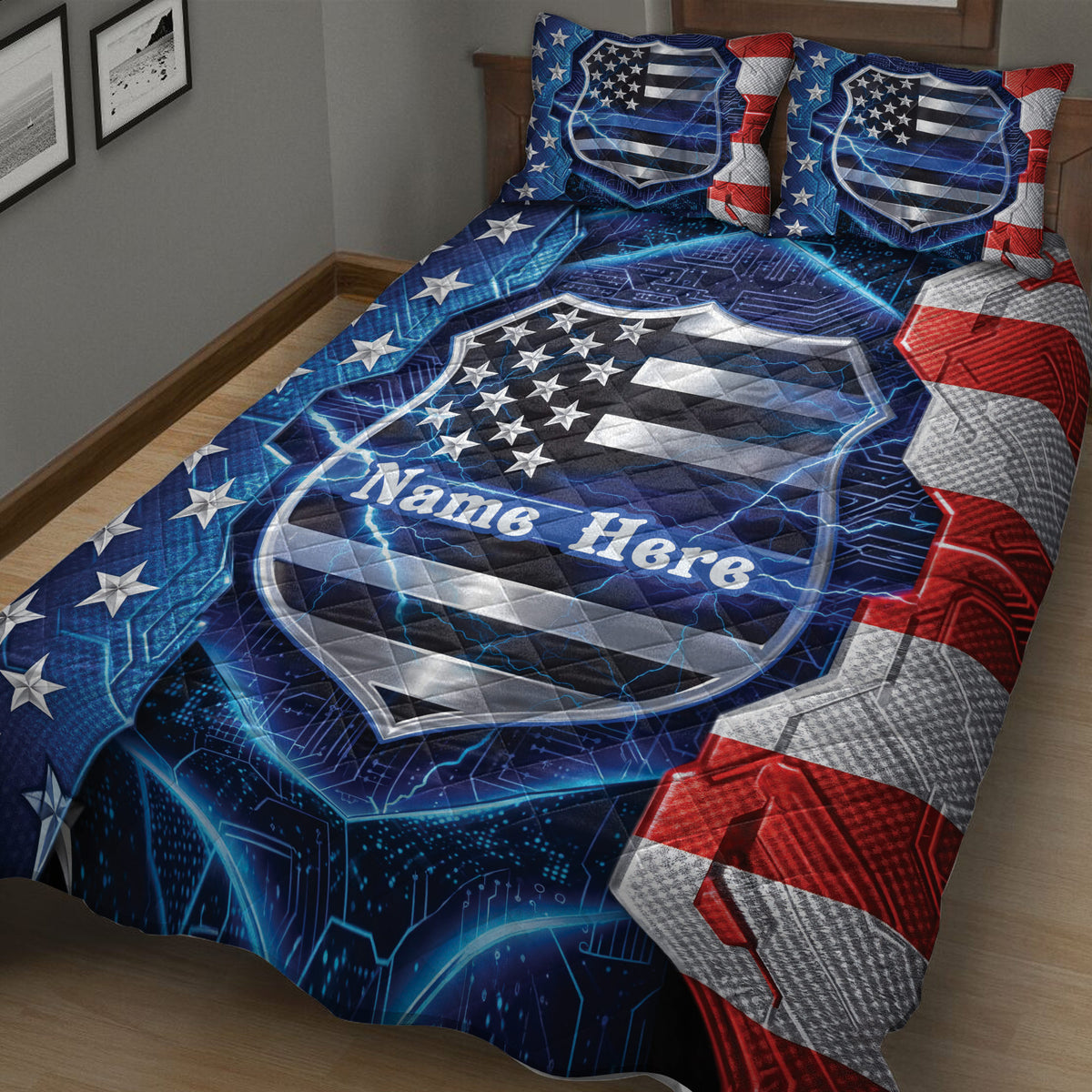 Close view of a police-themed quilt blanket with shield artwork, stars, lightning, and patriotic bedroom styling