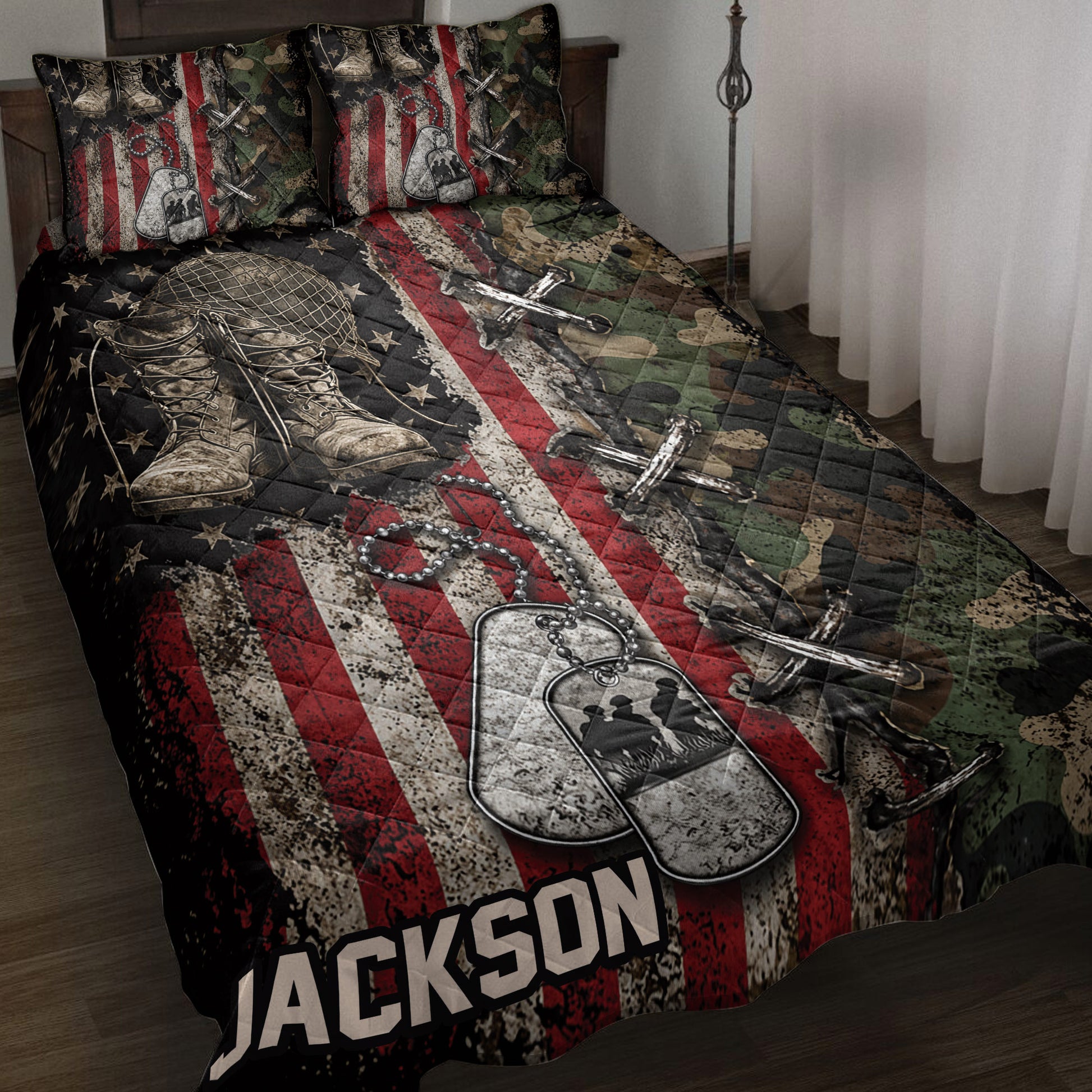 Veteran quilt blanket displayed on a bed with military boots, dog tags, camouflage and patriotic flag artwork