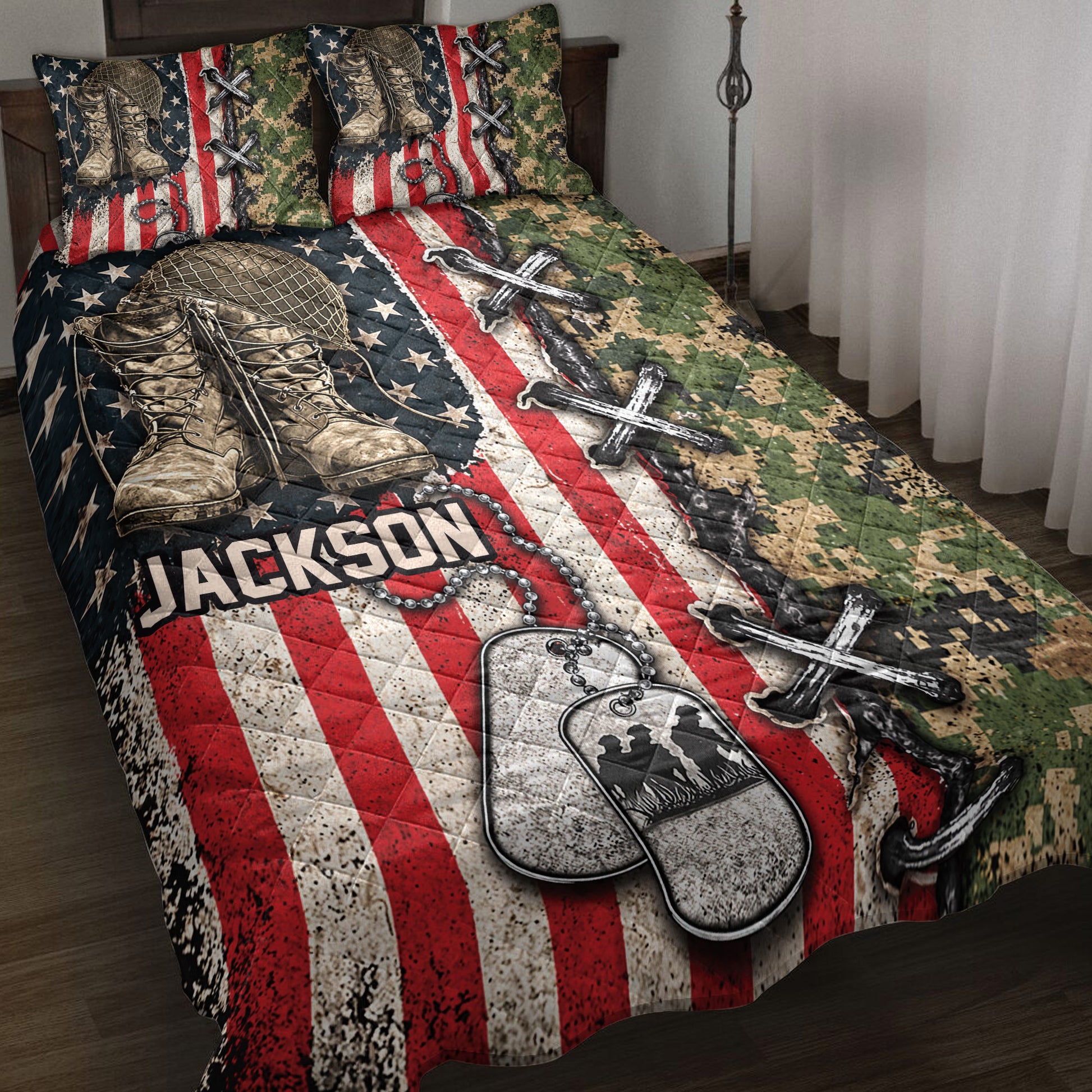 Veteran quilt blanket displayed on a bed with combat boots, camouflage, dog tags, and American flag artwork