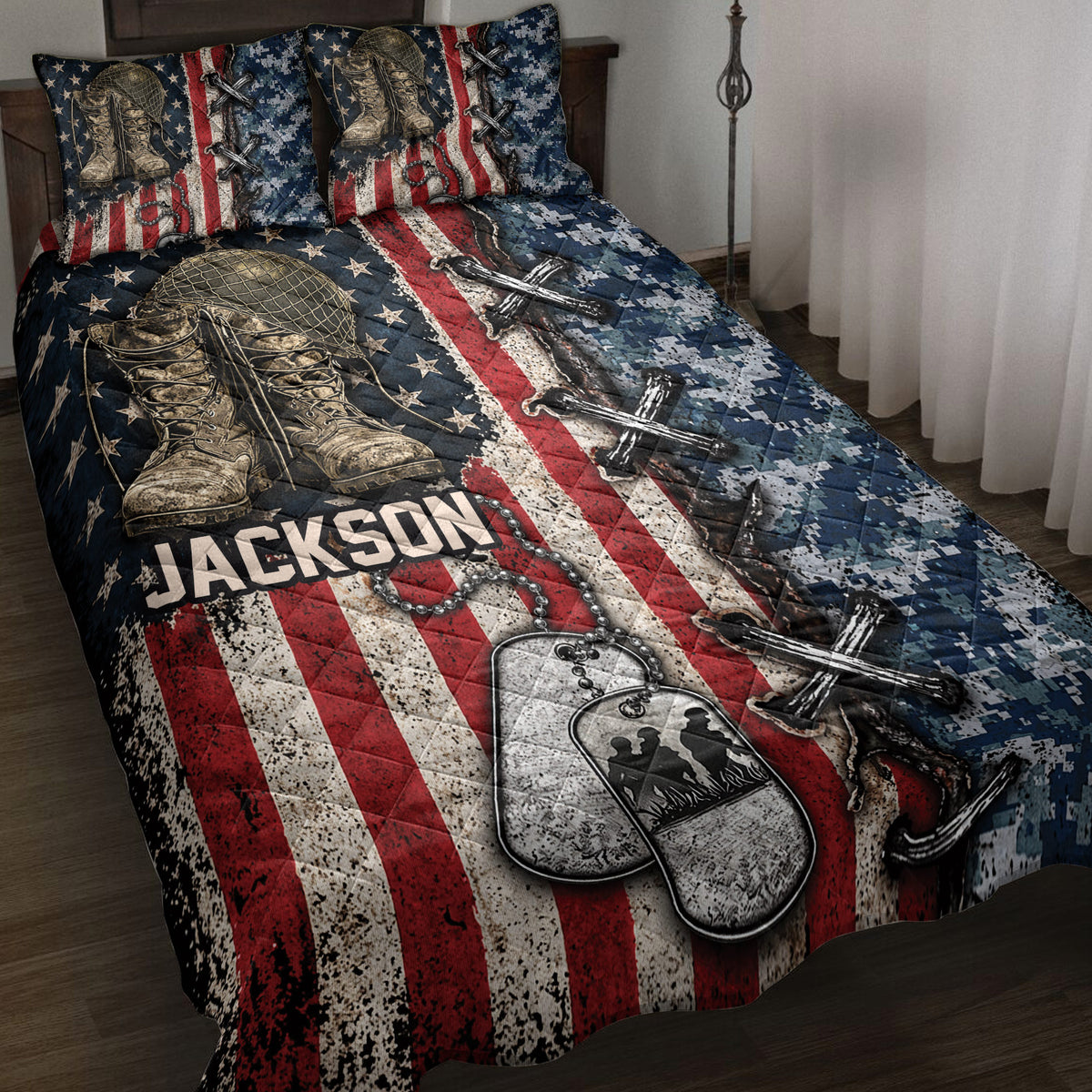 Veteran quilt blanket displayed on a bed with combat boots, helmet, dog tags, crossed rifles and flag artwork