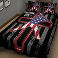 Baseball quilt blanket shown from an angled bedroom view with patriotic stars, stripes, and ballplayer artwork