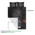Fishing quilt blanket shown with a printed front and quilted backing detail