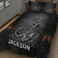 Angler-inspired quilt blanket shown from an angled bedroom view with fishing hook artwork and dark patriotic accents