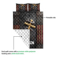 Christian cross quilt showing the printed front and white quilted reverse in a product detail view