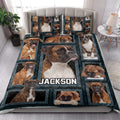 Boxer dog quilt blanket styled on a bedroom bed with coordinating Boxer dog pillow designs