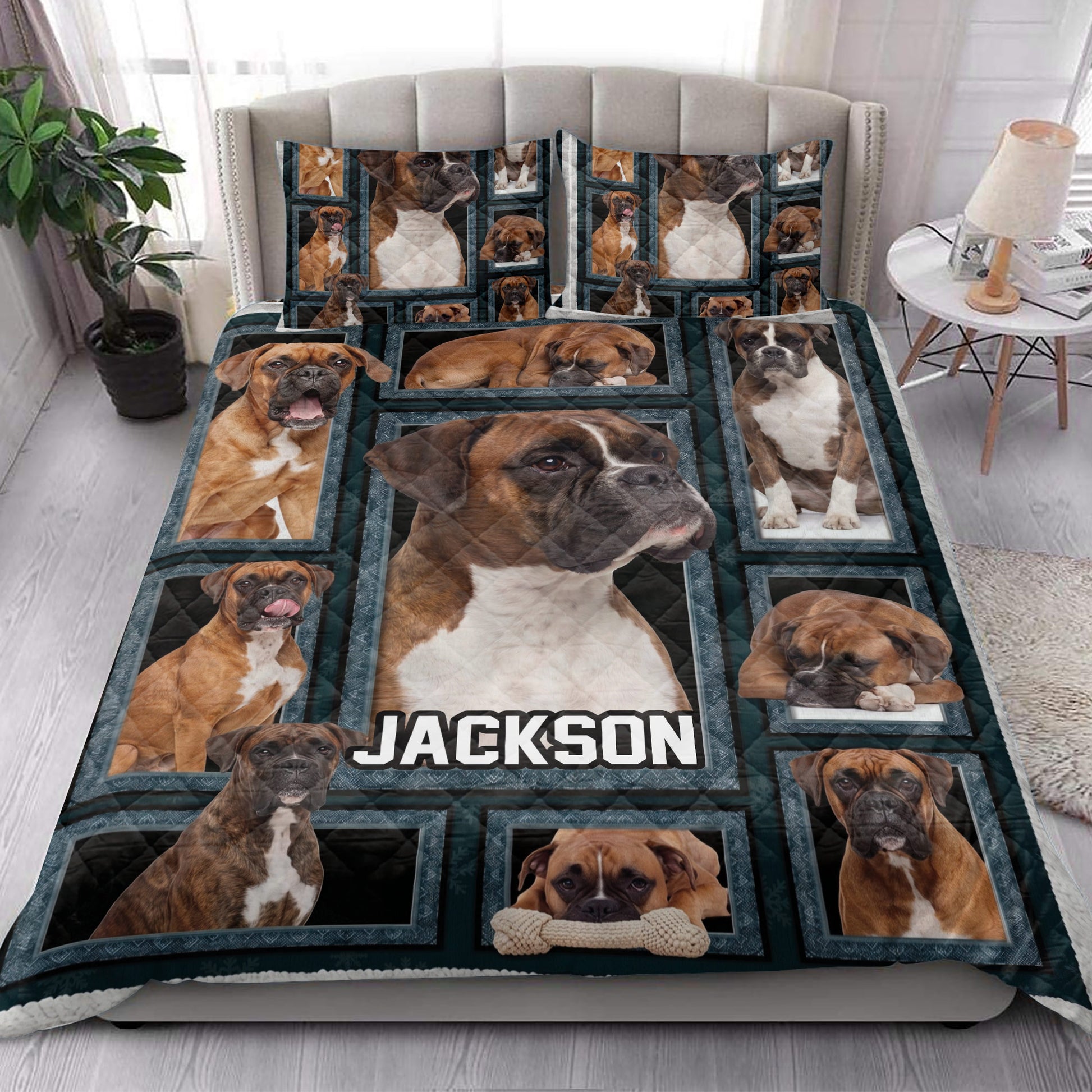 Boxer dog quilt blanket styled on a bedroom bed with coordinating Boxer dog pillow designs