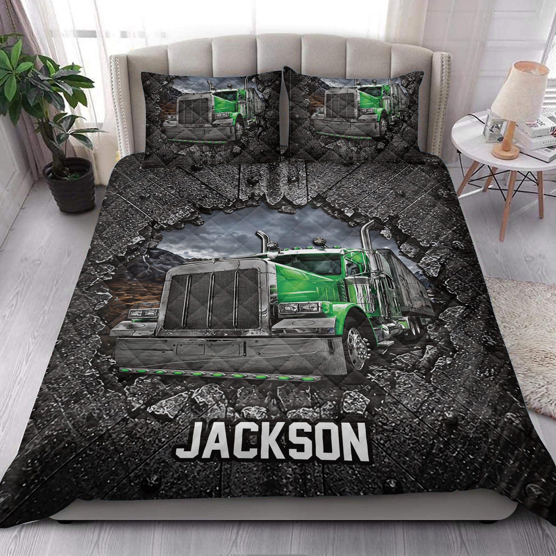 Green semi-truck quilt blanket styled in a modern bedroom with matching truck-themed pillow designs