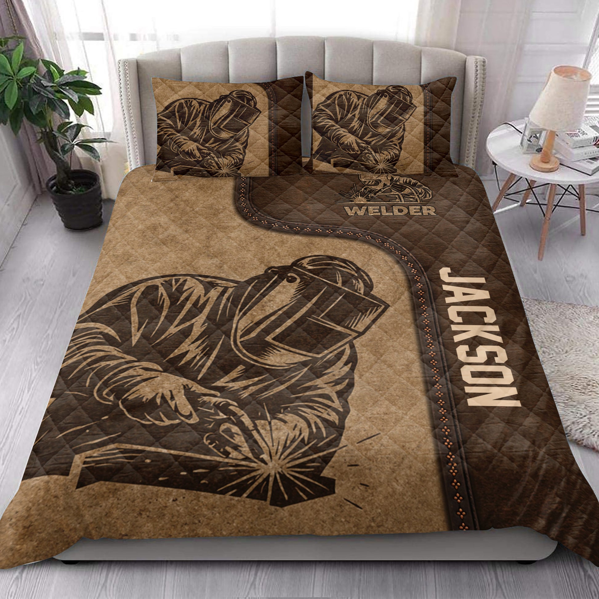 Welder quilt bedding styled in a bright bedroom with brown industrial artwork