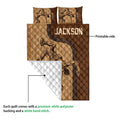 Wrestling quilt showing the printed brown front and white quilted polyester backing