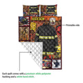 Firefighter quilt blanket detail showing the printed front, quilted backing, protective gear, and firehouse artwork
