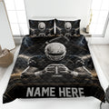 Football quilt blanket displayed on a bed with helmeted players, stadium lights, lightning, and black and gold sports artwork