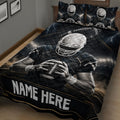 Close view of football quilt bedding with a helmeted player holding a football in a dramatic stadium scene