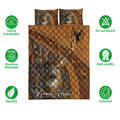 Hunting quilt bedding set shown with deer artwork, antlers, woodland colors, and product feature icons