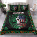 Irish Celtic quilt blanket presented in a bright bedroom with shamrocks, Celtic knots, and a colorful tree design