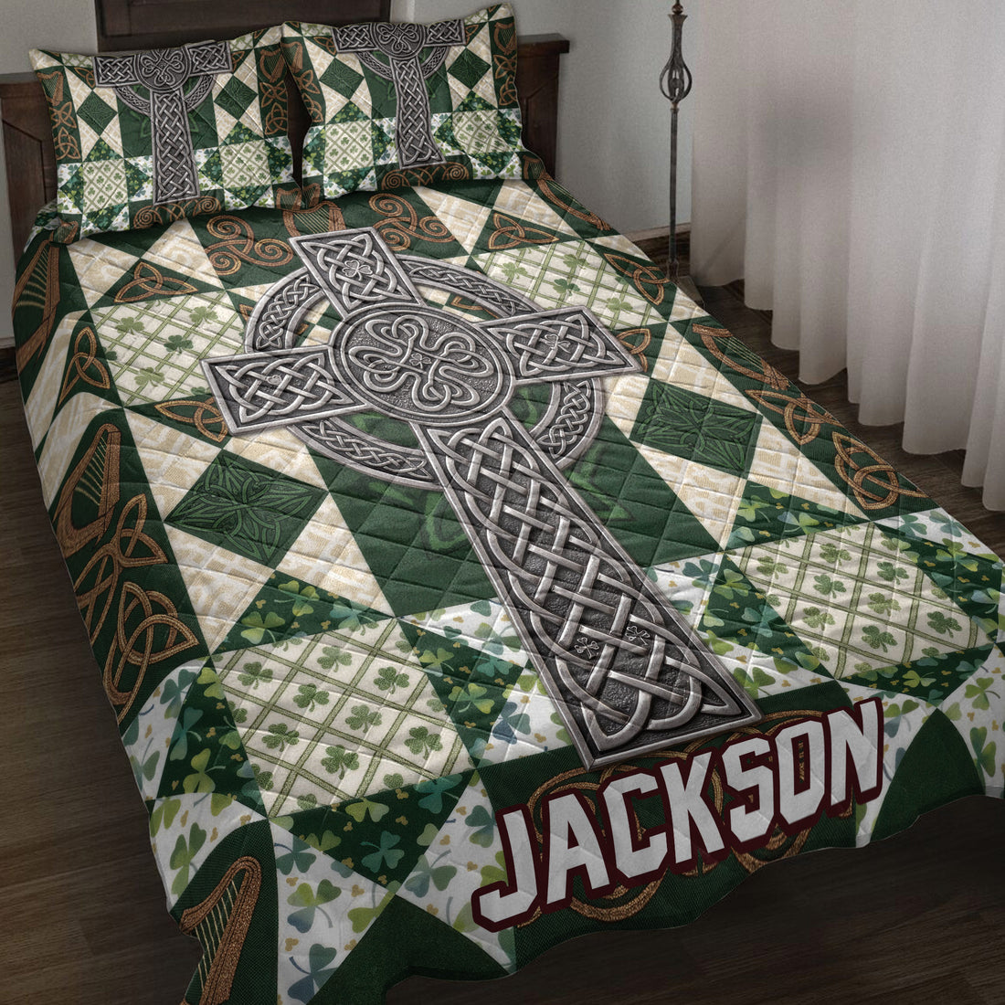 Irish quilt blanket bedding set displayed on a bed with Celtic cross, knotwork, shamrocks, and green plaid artwork