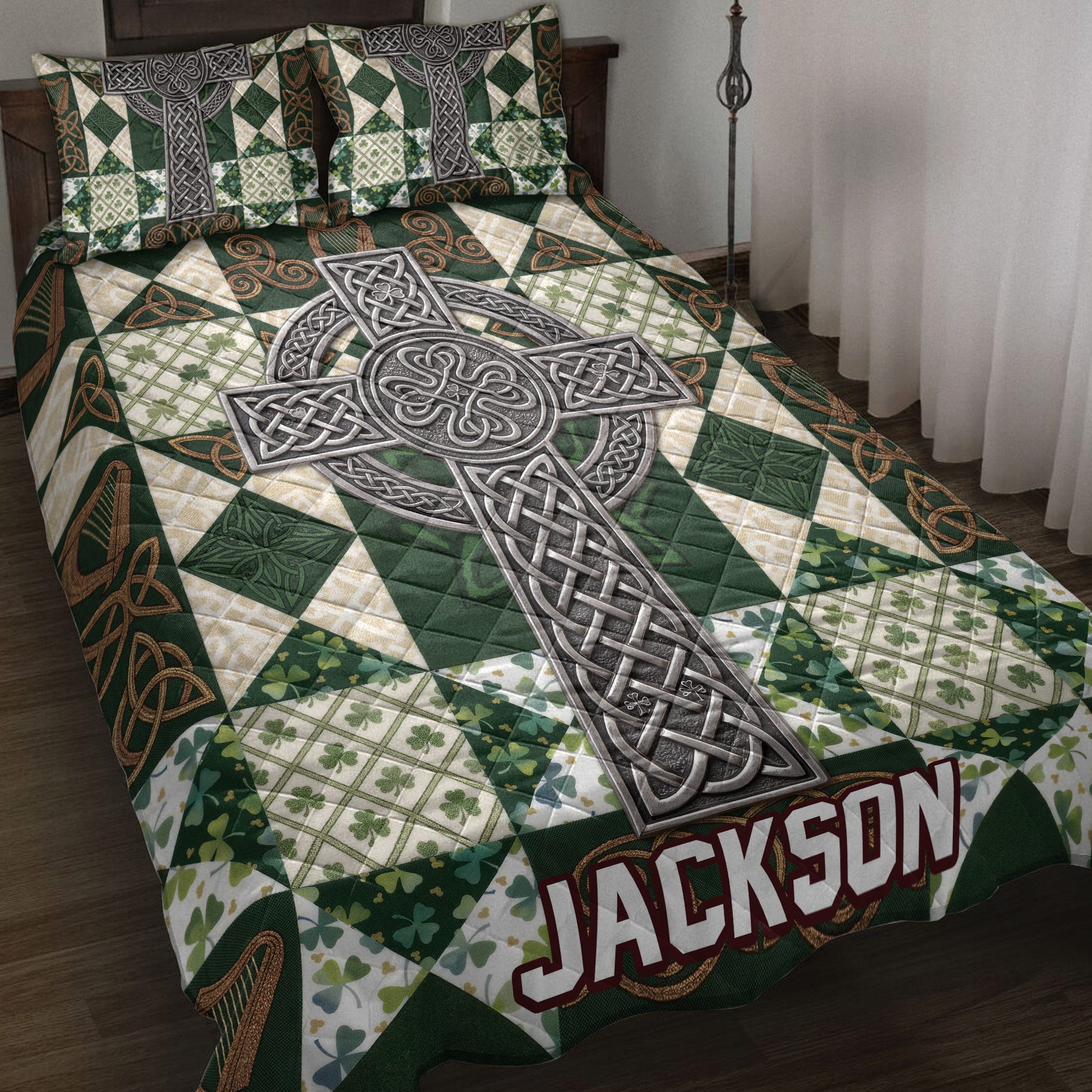 Irish quilt blanket bedding set displayed on a bed with Celtic cross, knotwork, shamrocks, and green plaid artwork