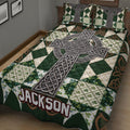 Close bedroom view of Irish Celtic bedding with a metallic cross, Celtic knotwork, harps, and shamrock patchwork