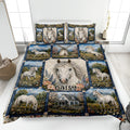 Horse quilt bedding set displayed on a bed with white horses, flowers, mountains, and pastoral scenery