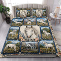 Horse quilt blanket styled in a bright bedroom with white horses, flowers, mountains, and a farmhouse scene
