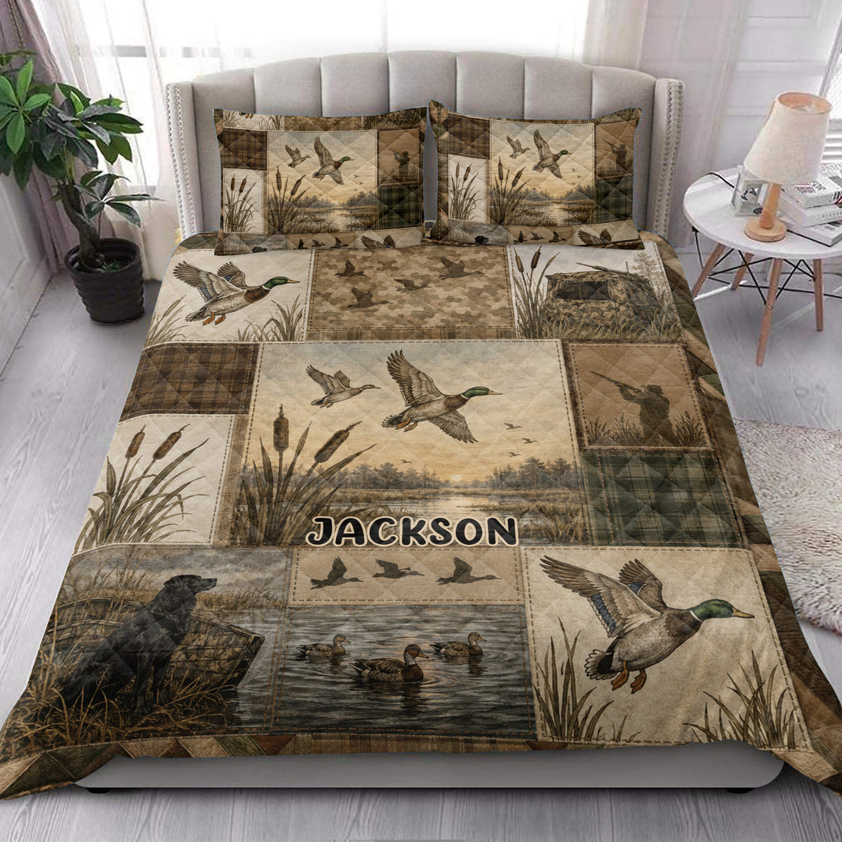 Duck hunting quilt blanket styled on a bed with mallards, cattails, marshland, camouflage, and rustic lodge artwork