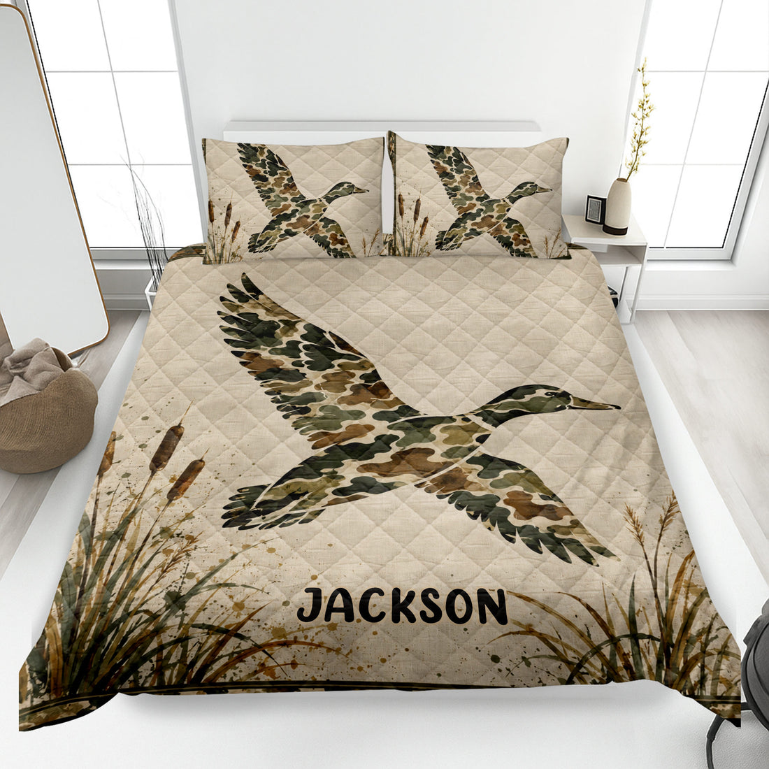 Duck hunting quilt blanket displayed on a bed with flying camouflage ducks and marsh cattails