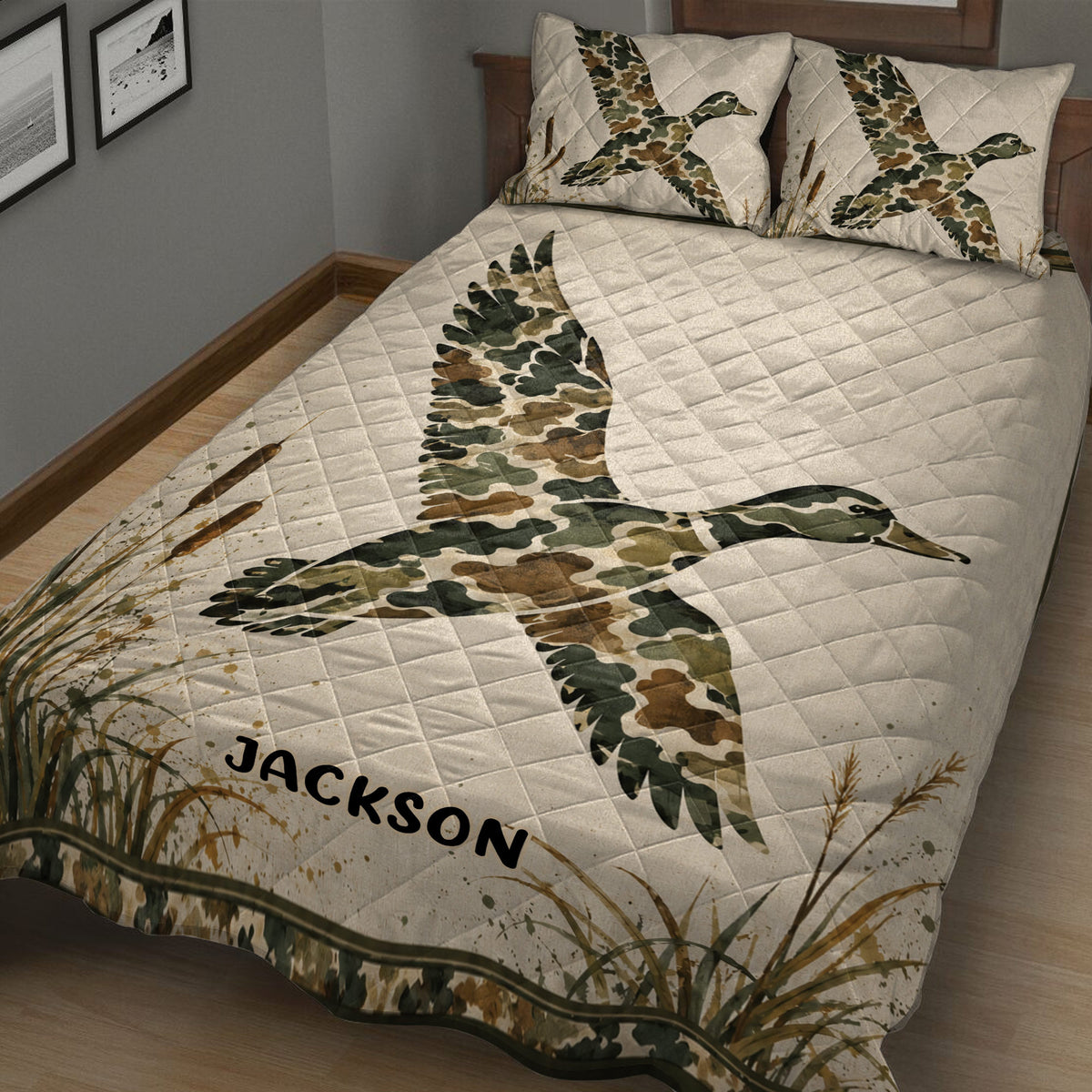 Duck hunting quilt displayed on a wooden bed with flying ducks and cattail marsh artwork