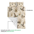 Duck hunting quilt blanket shown with printed mallard artwork and a white quilted backing detail